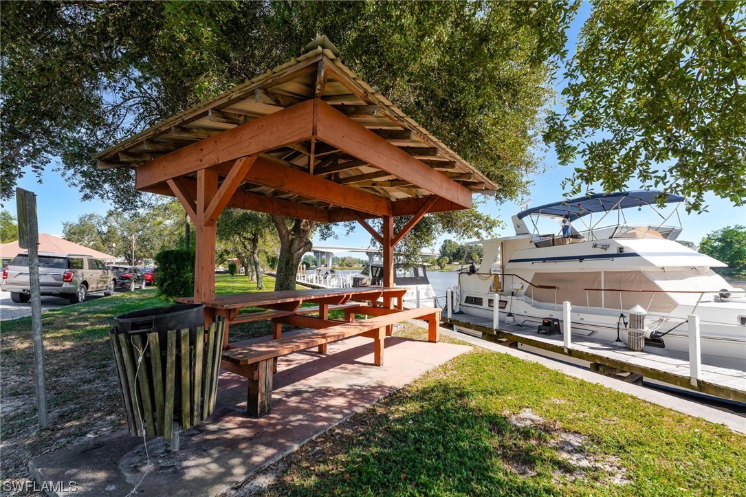 300 1st Street Moore Haven, FL 33471 - Photo 6 of 45 an outdoor space with seating