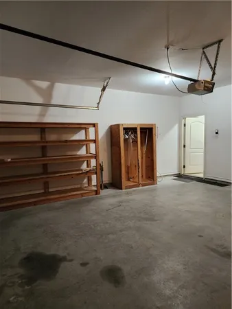 a view of empty room with ceiling fan
