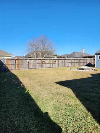 a view of a lake with a big yard