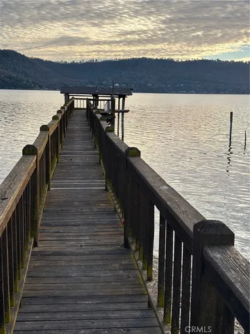 a view of wooden floor with a lake