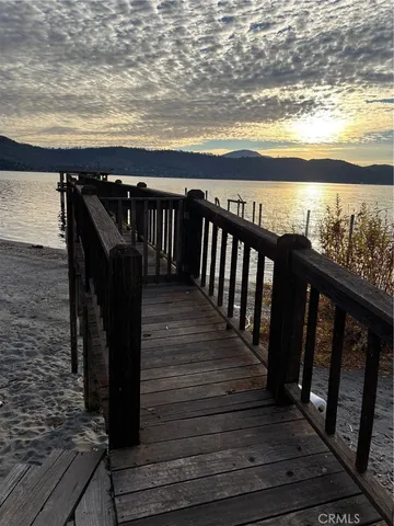 a view of deck with wooden floor and seating space