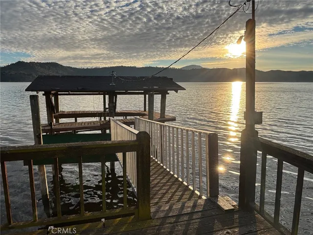 a view of a balcony with wooden floor