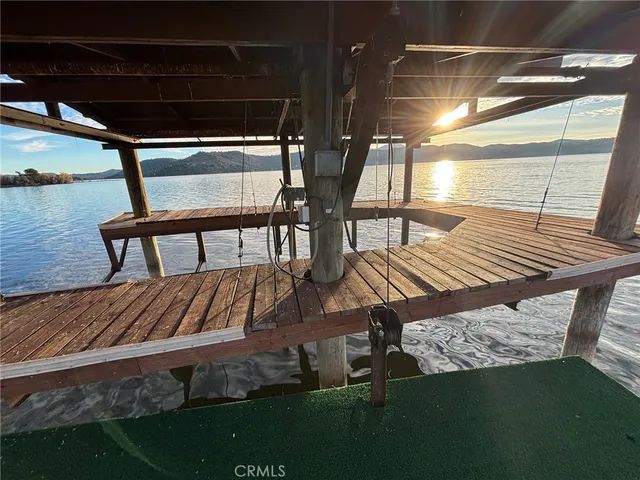 a view of balcony with wooden floor