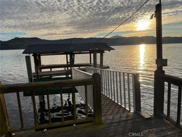 a view of a balcony with wooden floor