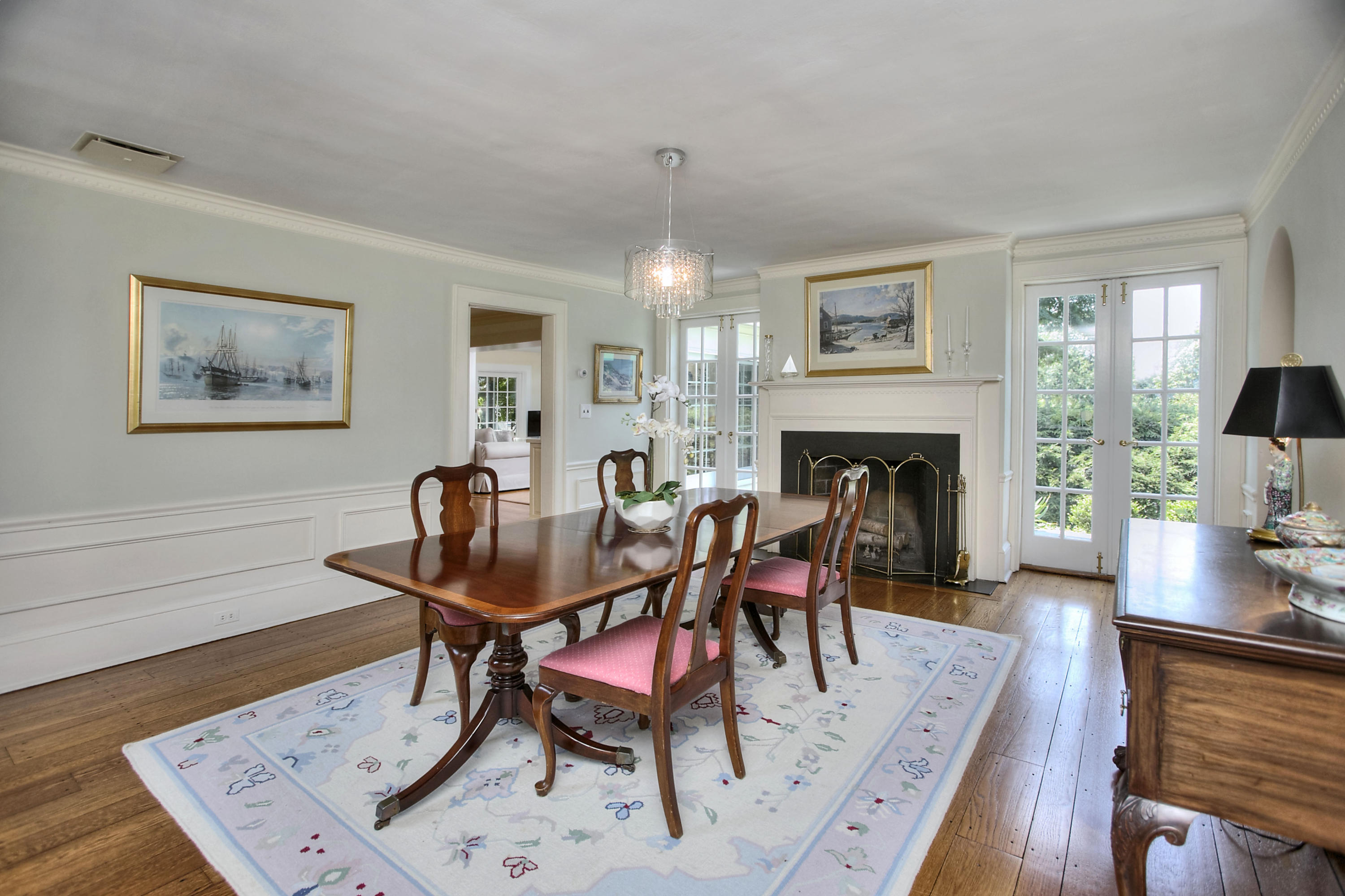 9 Sunswyck Road Darien, CT 06820 - Photo 13 of 43 a view of a livingroom with furniture and a fireplace
