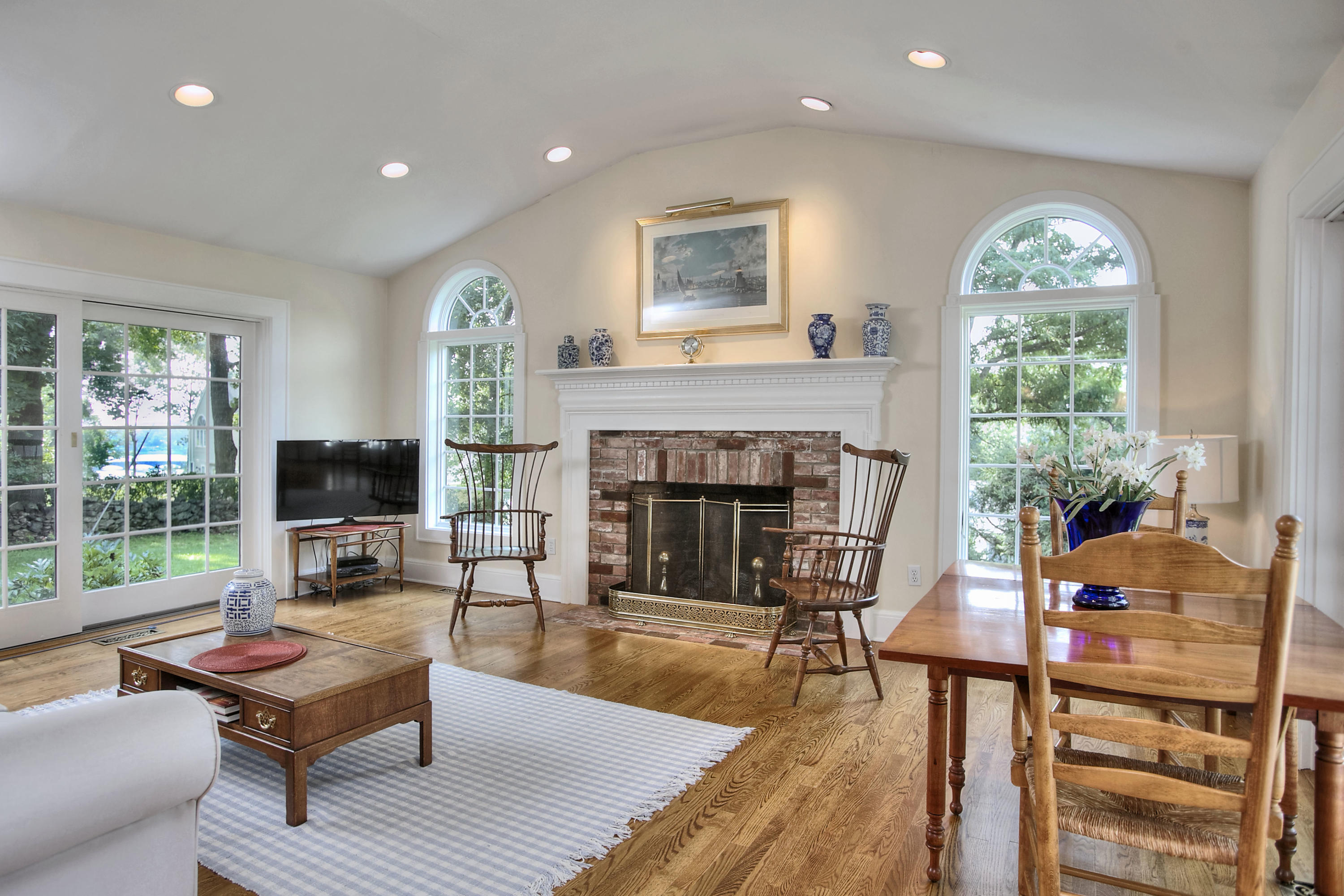 9 Sunswyck Road Darien, CT 06820 - Photo 19 of 43 a living room with furniture and a fireplace