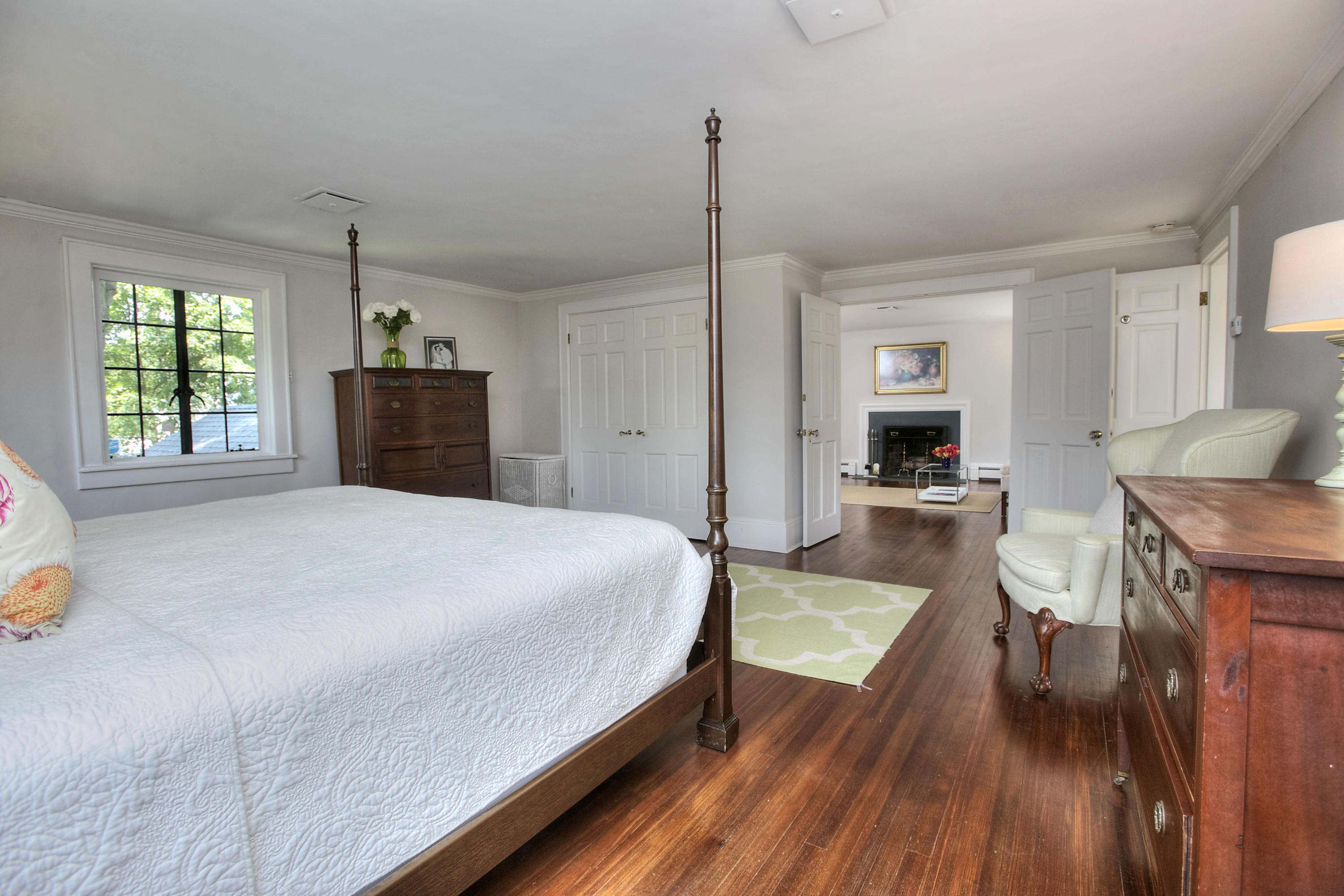 9 Sunswyck Road Darien, CT 06820 - Photo 22 of 43 a bed room with a bed and a television