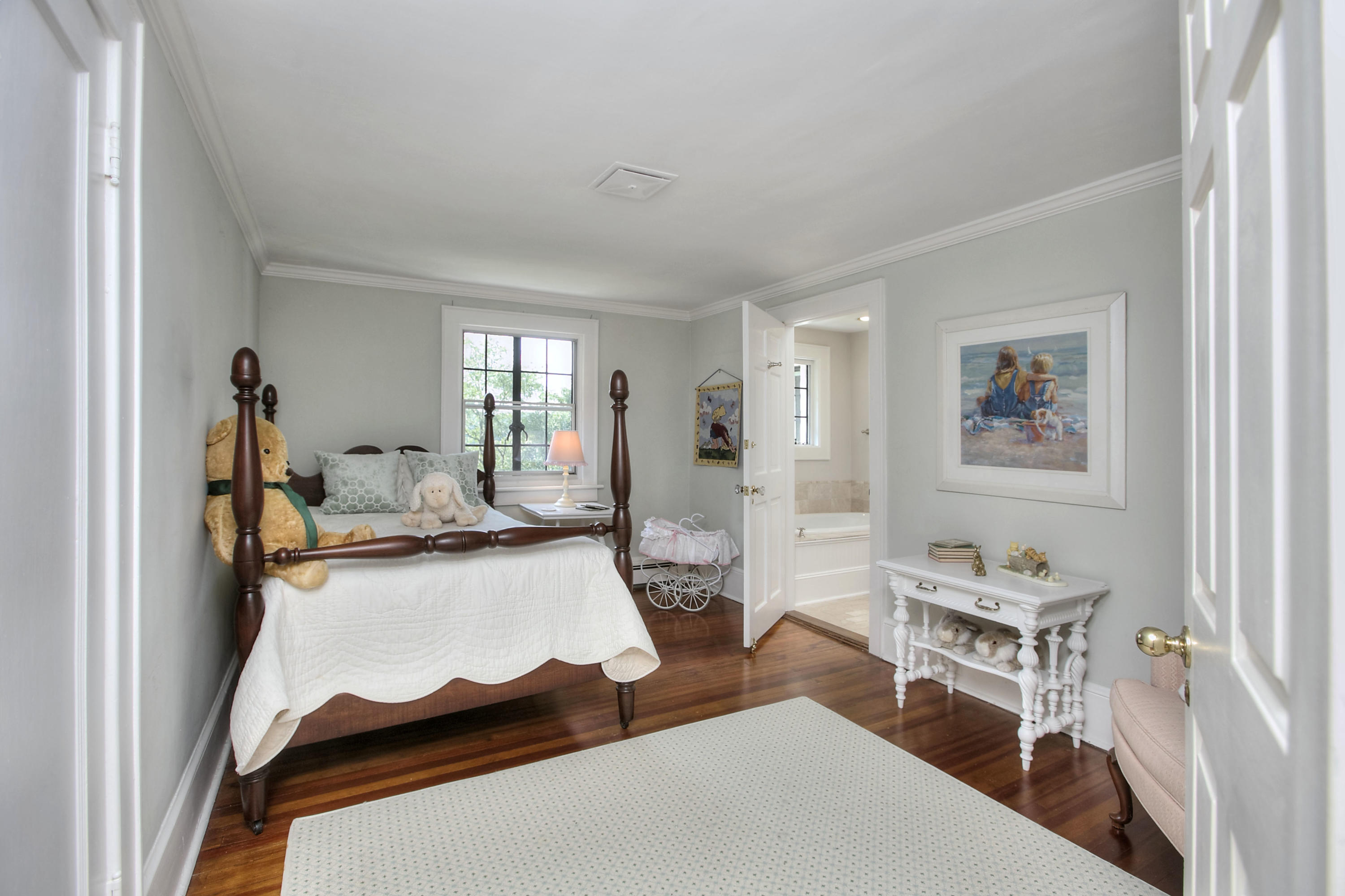 9 Sunswyck Road Darien, CT 06820 - Photo 27 of 43 a room with furniture a rug and a window