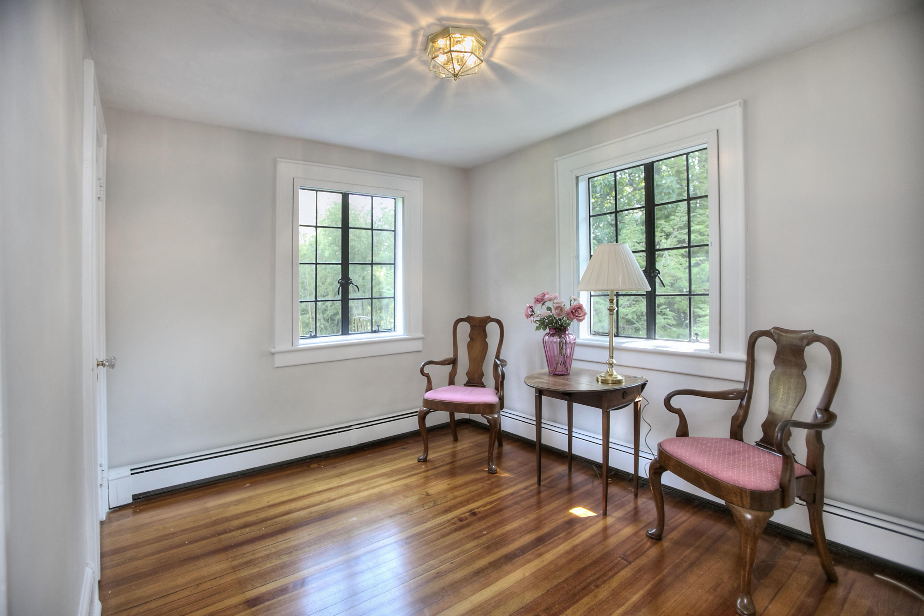 9 Sunswyck Road Darien, CT 06820 - Photo 32 of 43 a living room with furniture and a window