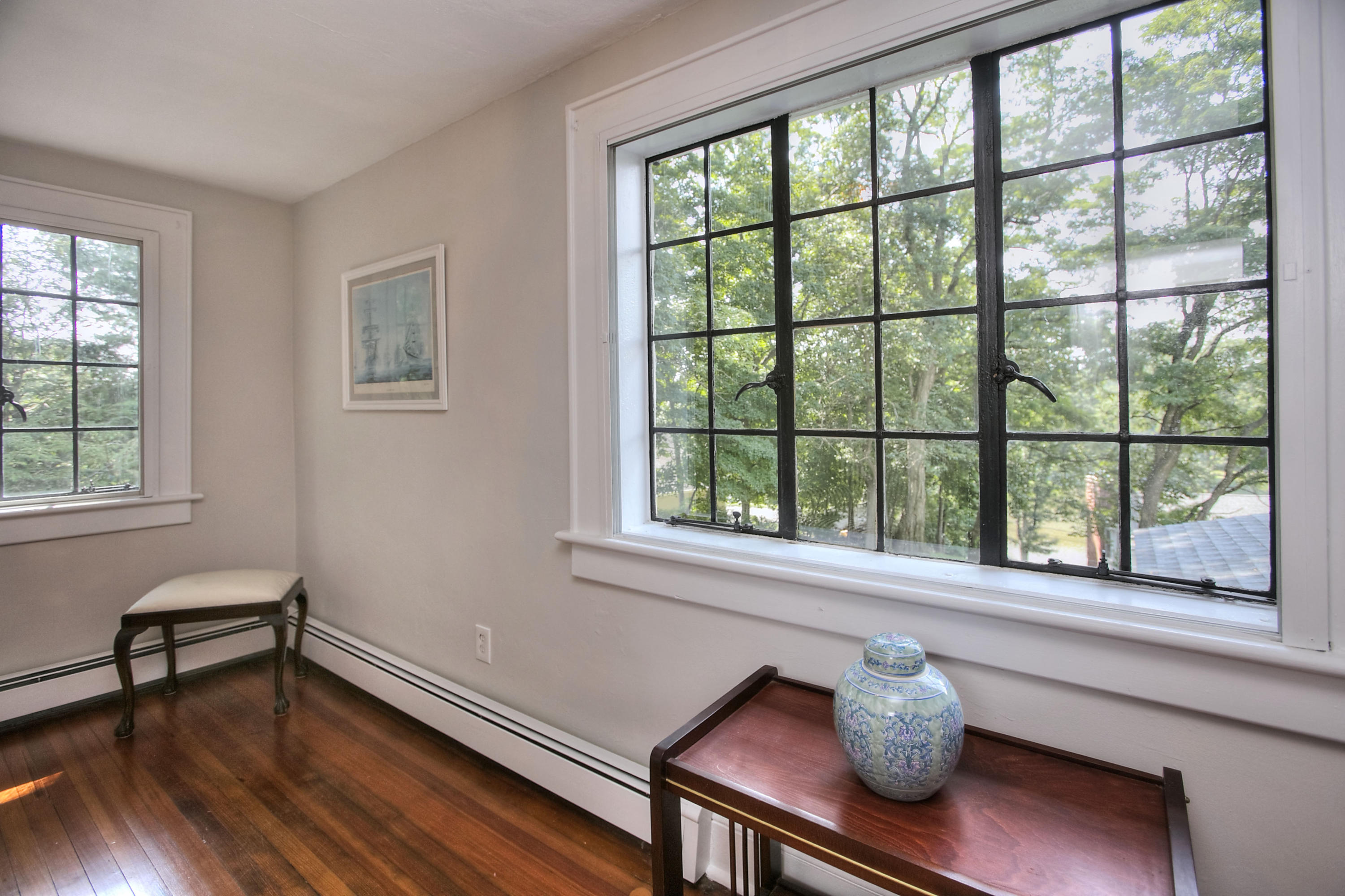 9 Sunswyck Road Darien, CT 06820 - Photo 34 of 43 a living room with furniture and a window