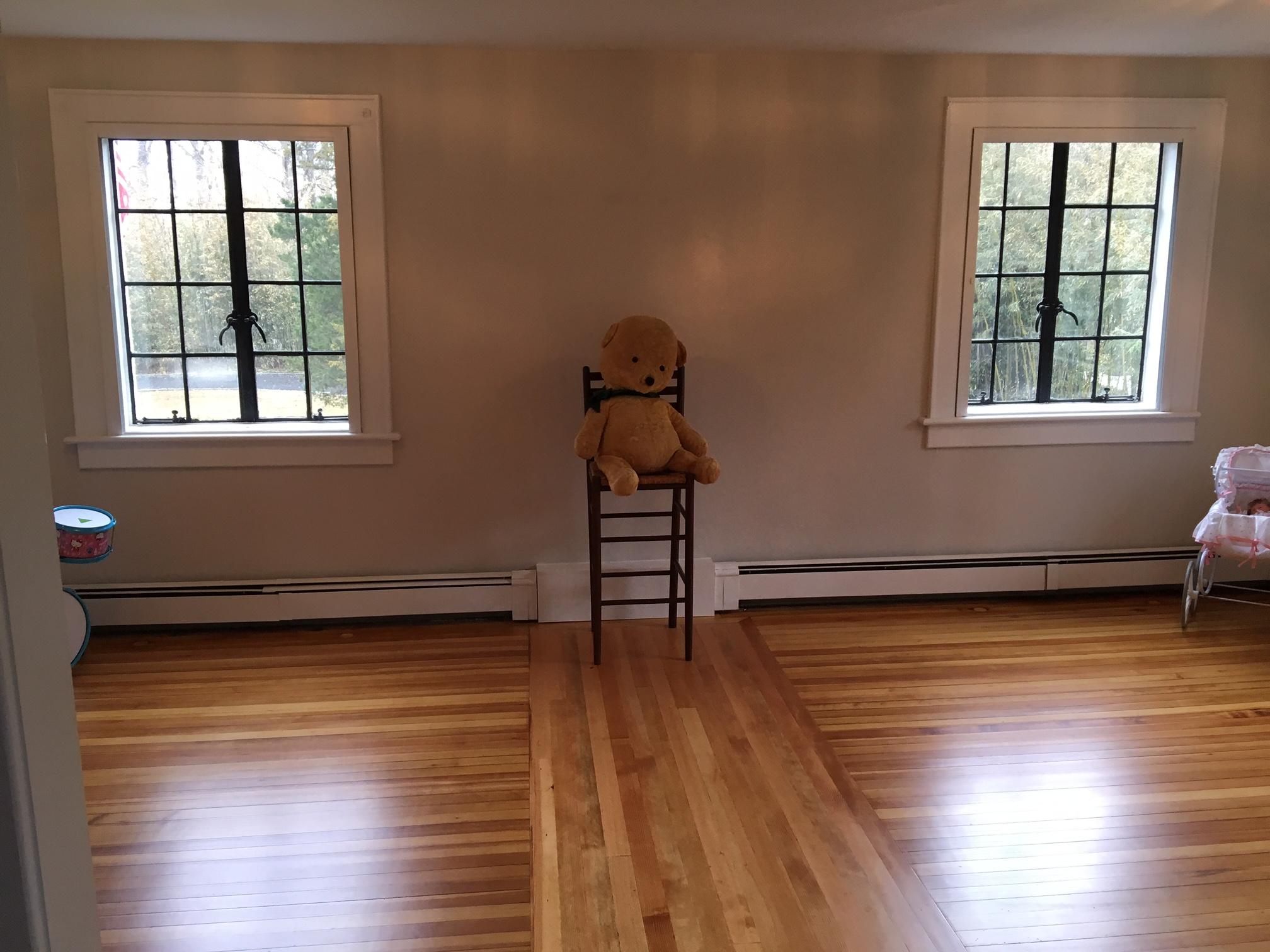 9 Sunswyck Road Darien, CT 06820 - Photo 35 of 43 a view of a room with wooden floor and window