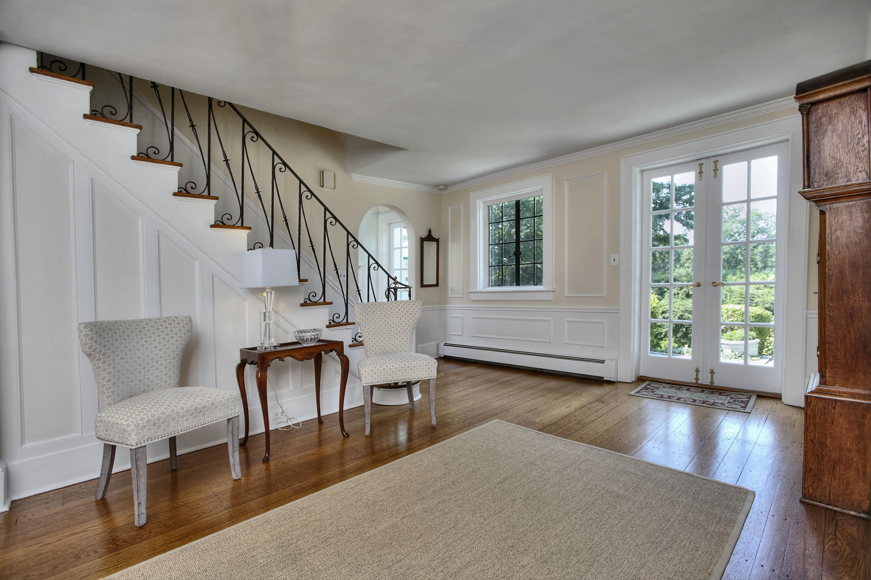 9 Sunswyck Road Darien, CT 06820 - Photo 5 of 43 a view of livingroom with furniture staircase and windows