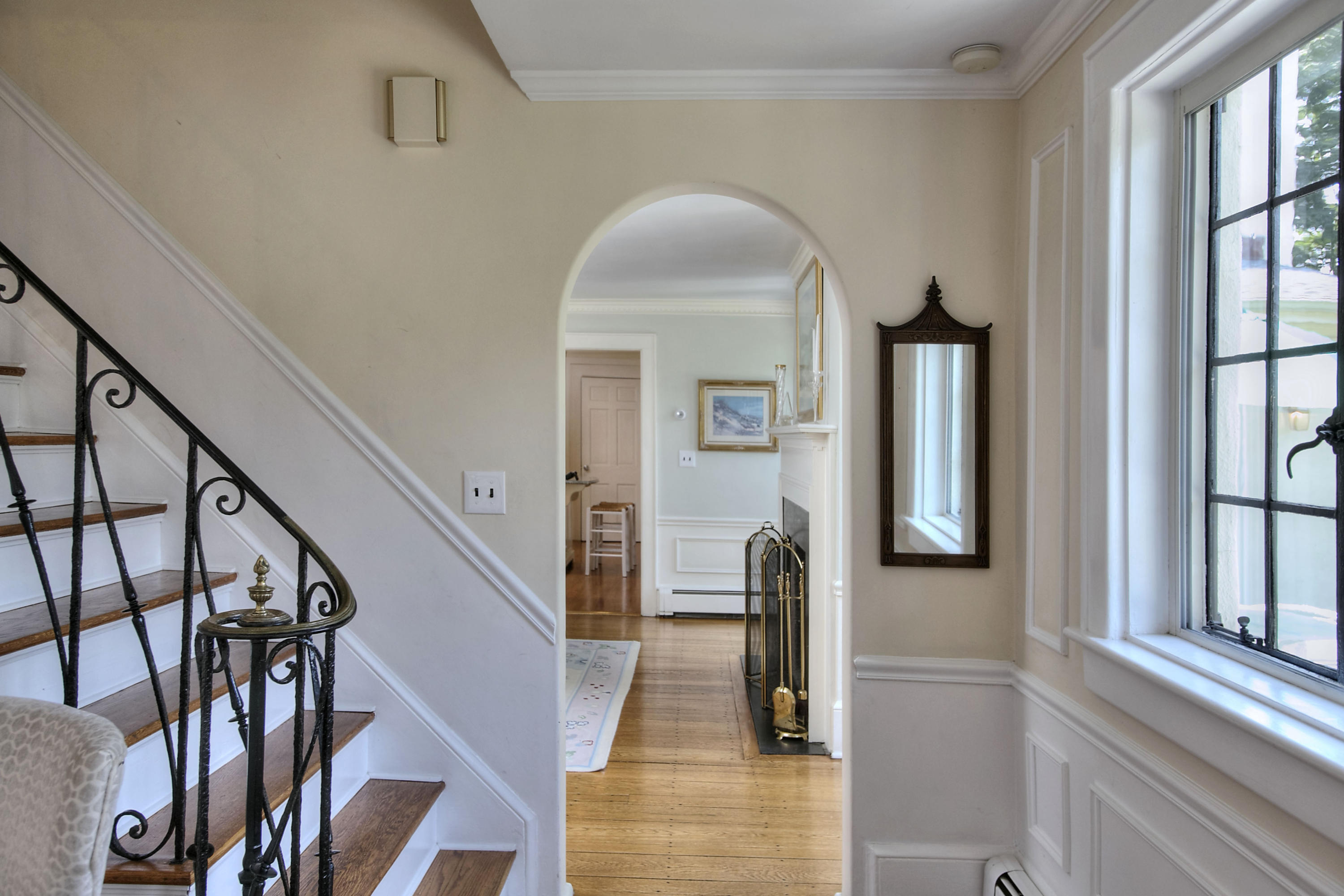 9 Sunswyck Road Darien, CT 06820 - Photo 8 of 43 a view of staircase with white walls and a window