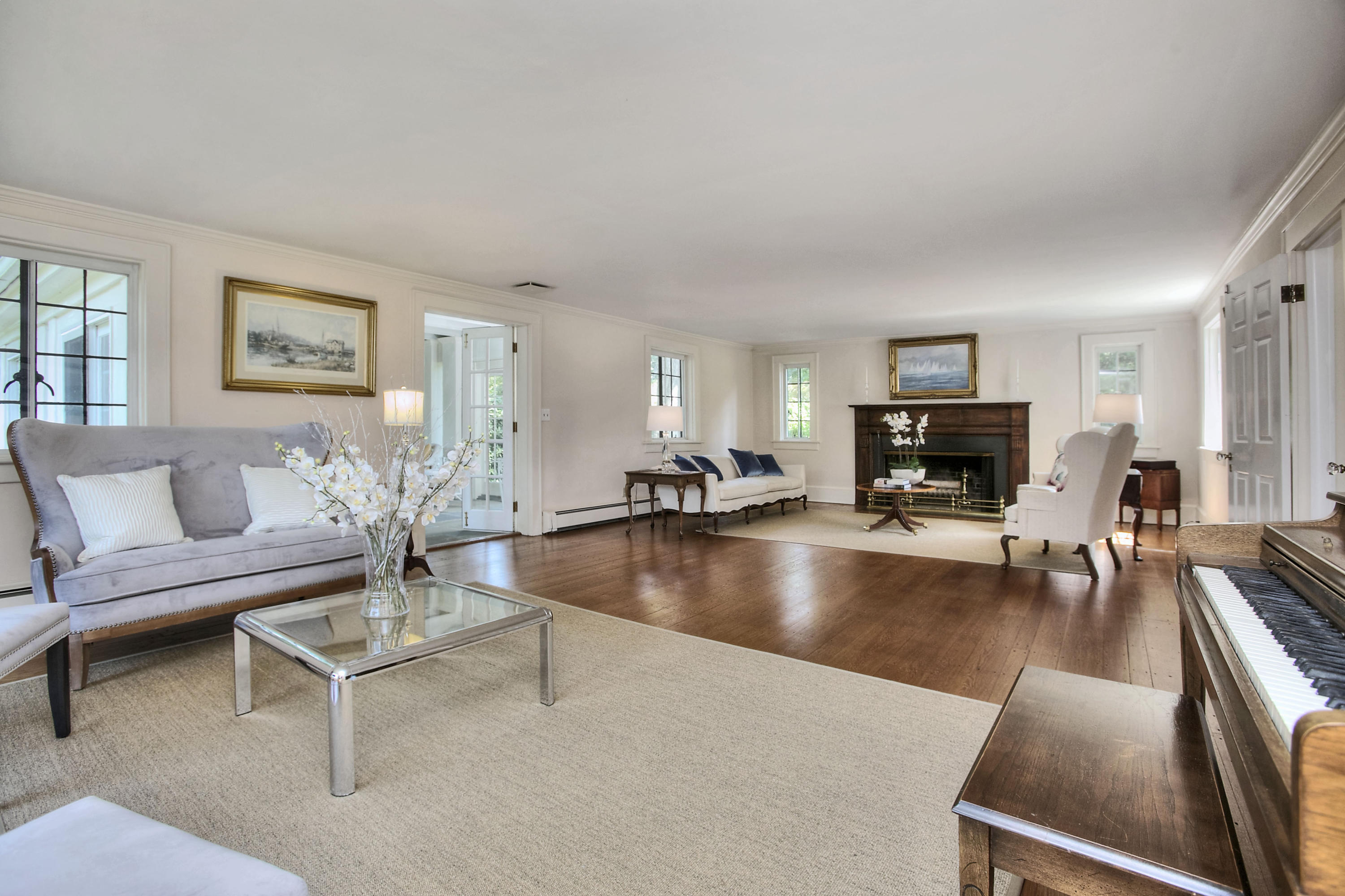 9 Sunswyck Road Darien, CT 06820 - Photo 10 of 43 a living room with furniture and a flat screen tv