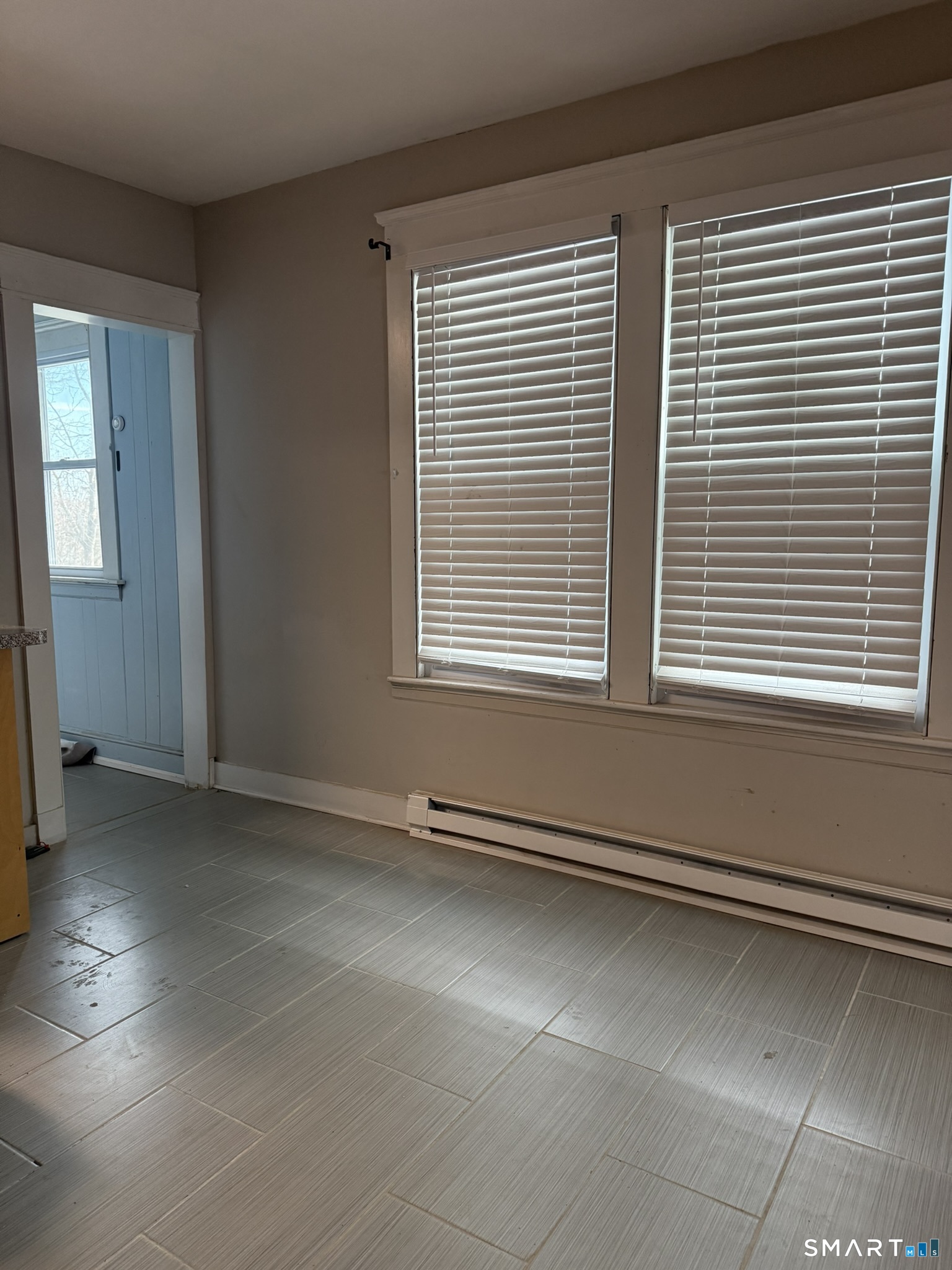 158 Alder Street, Unit 3 Waterbury, CT 06708 - Photo 17 of 19 a view of an empty room with a window