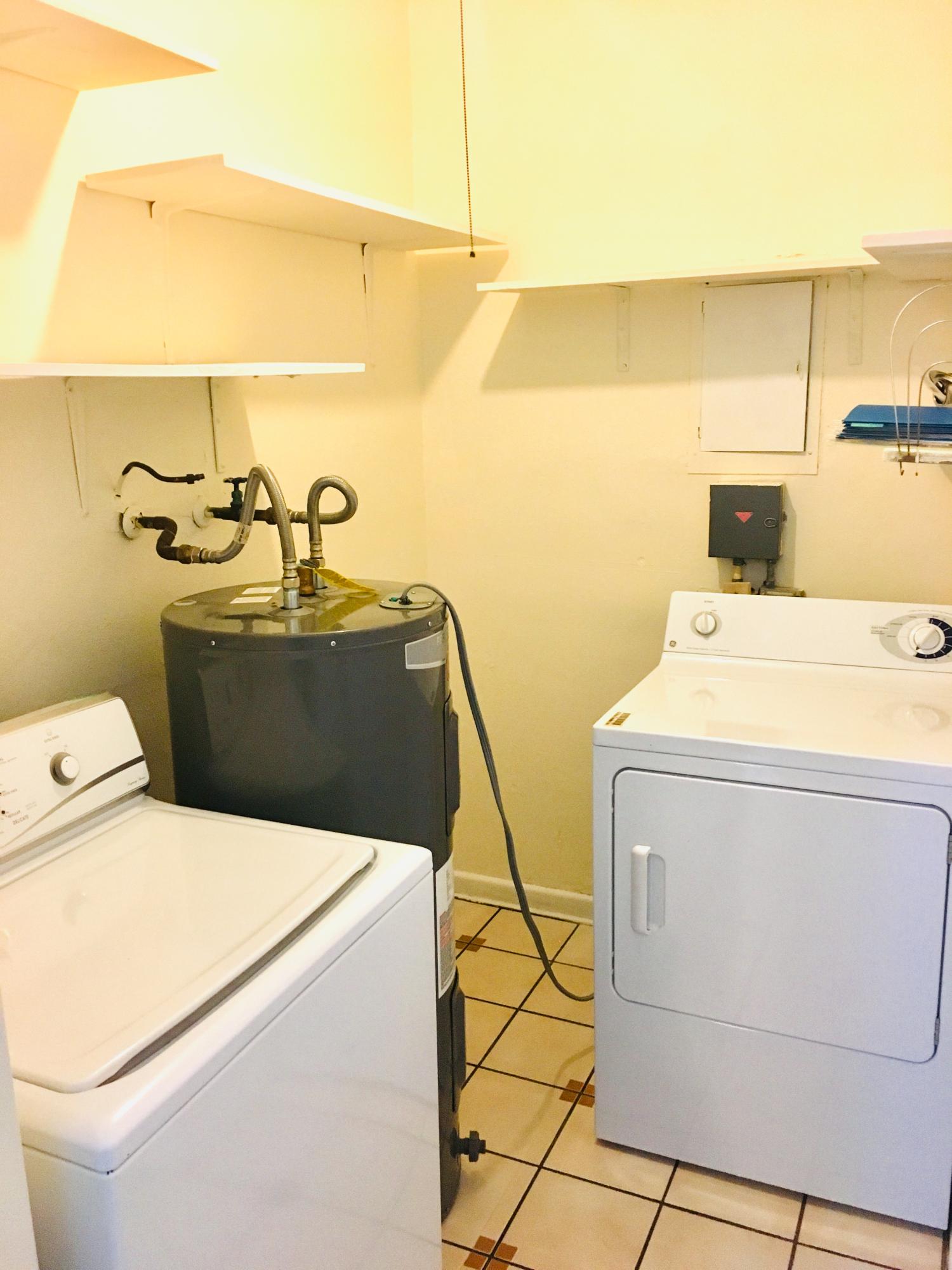 321 Winged Foot Road Palm Springs, FL 33461 - Photo 19 of 30 a utility room with dryer and washer