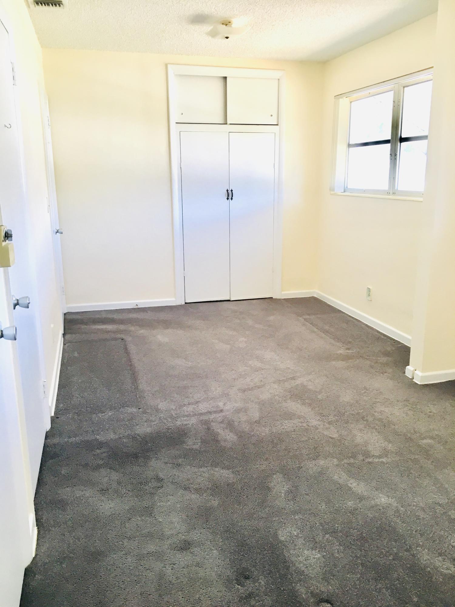 321 Winged Foot Road Palm Springs, FL 33461 - Photo 23 of 30 a view of a room with an empty space