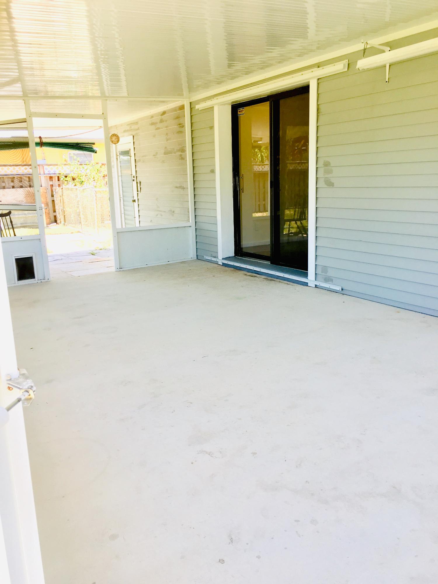 321 Winged Foot Road Palm Springs, FL 33461 - Photo 8 of 30 a view of an empty room