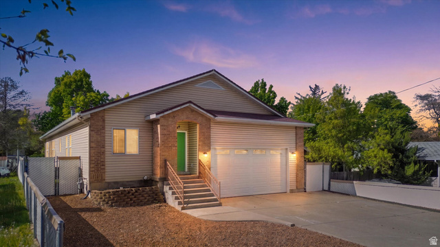 560 East 700 North Logan, UT 84321 - Photo 1 of 32 Contemporary residence featuring a brick and siding exterior