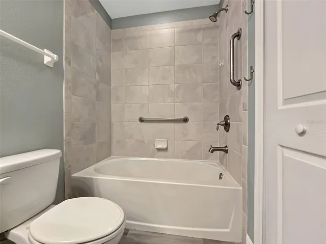 a bathroom with a sink cabinets and a sink