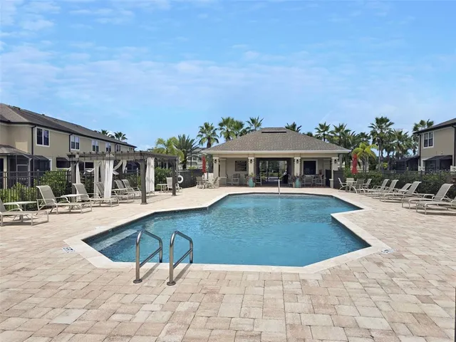 a view of a terrace with chairs
