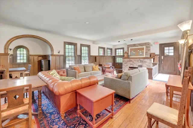 a dining room with a table and chairs