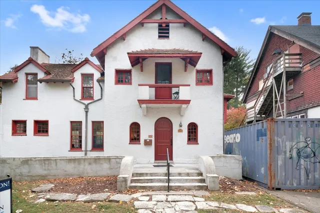 a front view of a house with garage