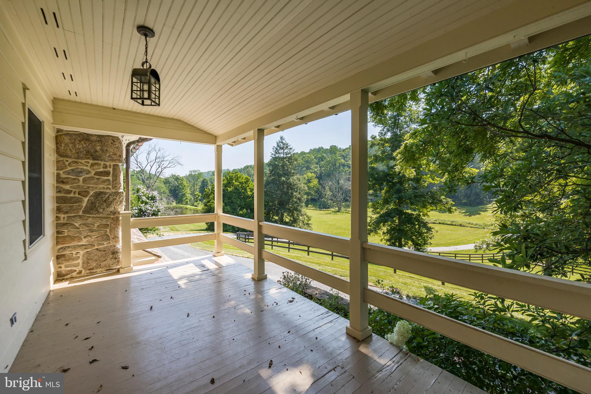 1351 Warwick Furnace Road Pottstown, PA 19465 - Photo 48 of 76 Covered Porch of Guest qtrs-serene view of grounds