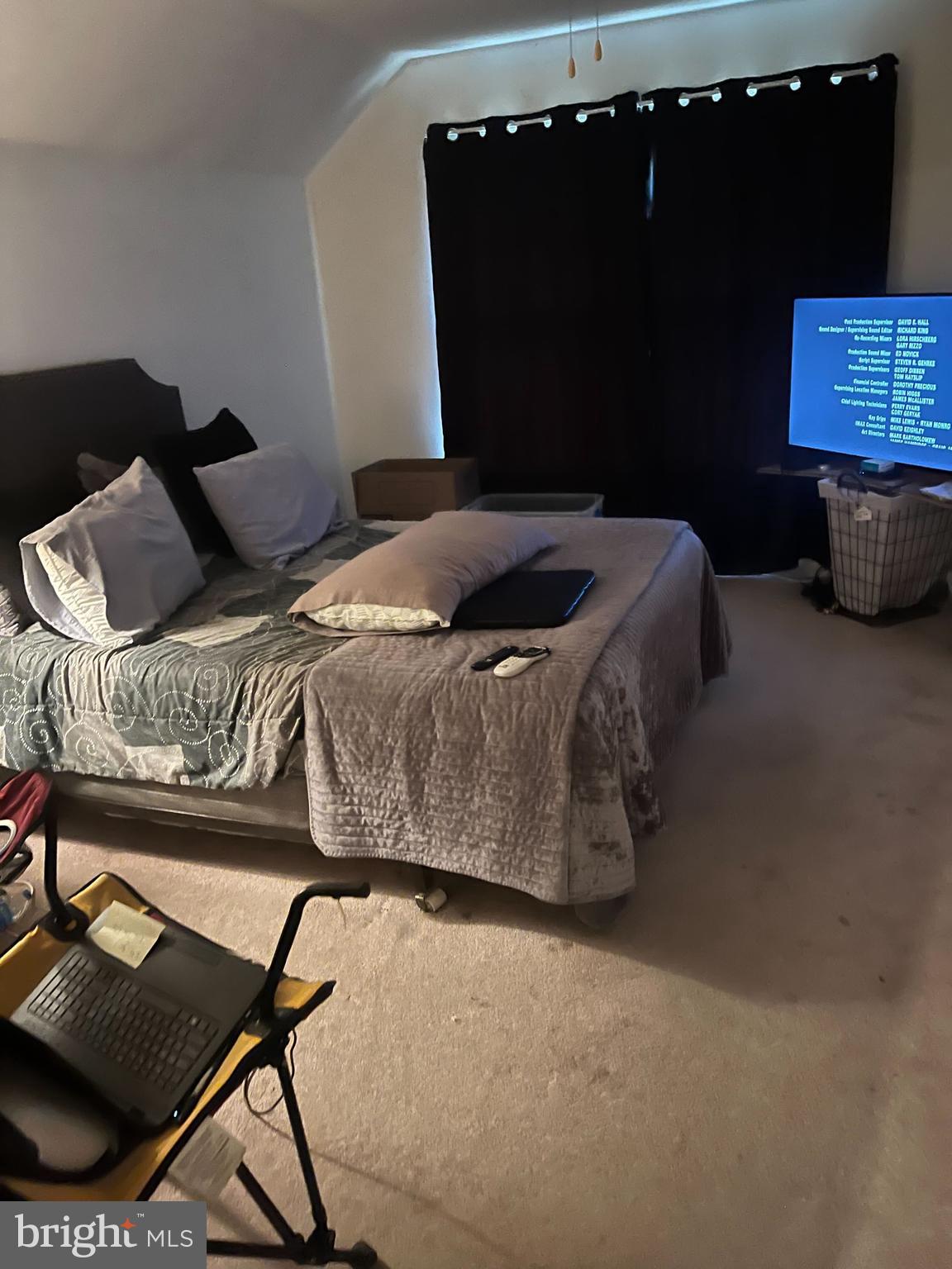 6107 Spring Meadow Lane Frederick, MD 21701 - Photo 2 of 10 a bedroom with a bed and wooden floor