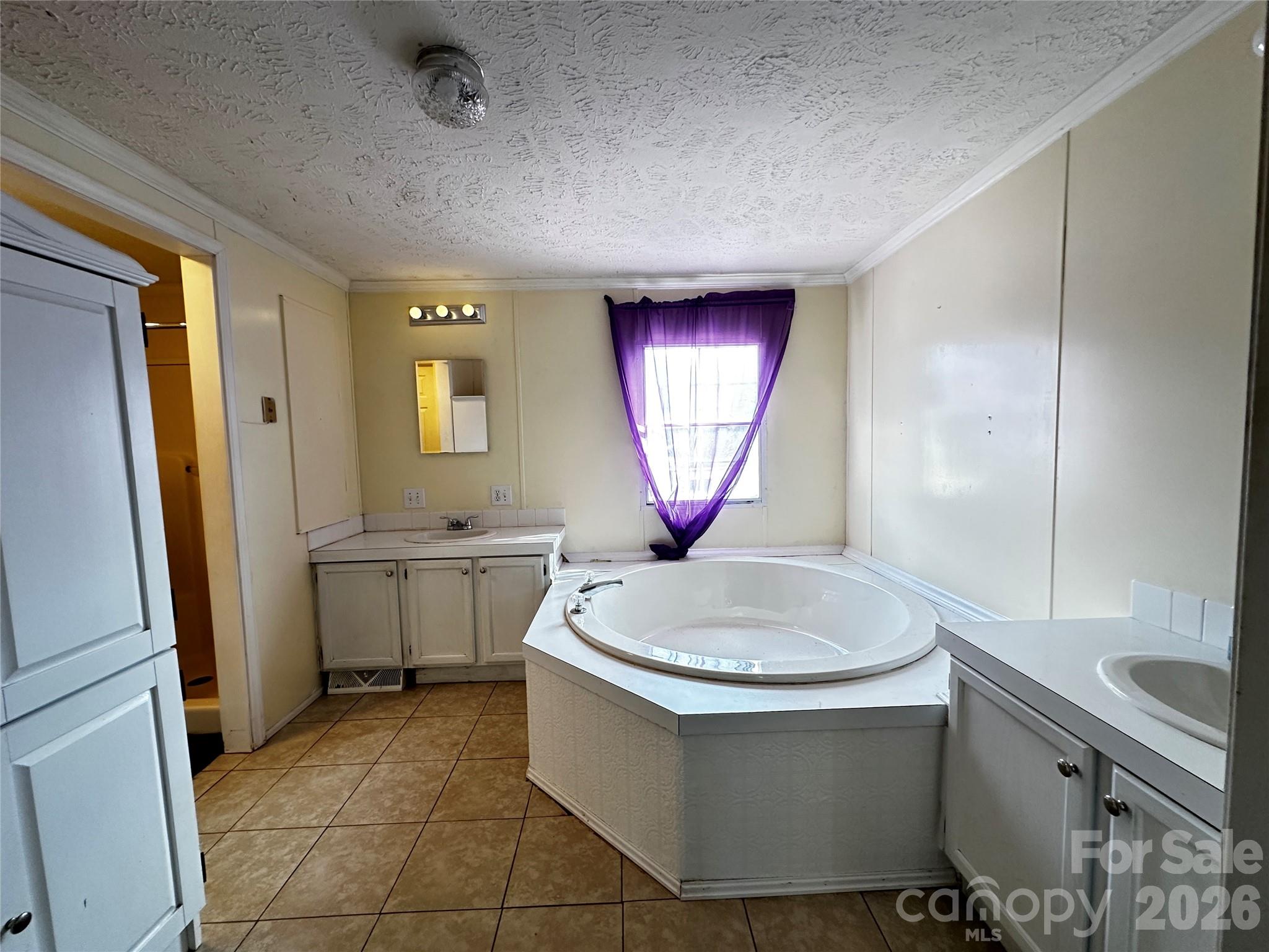 7447 Highway 64, Unit 2 Morganton, NC 28655 - Photo 25 of 27 a bathroom with a sink a toilet and a mirror