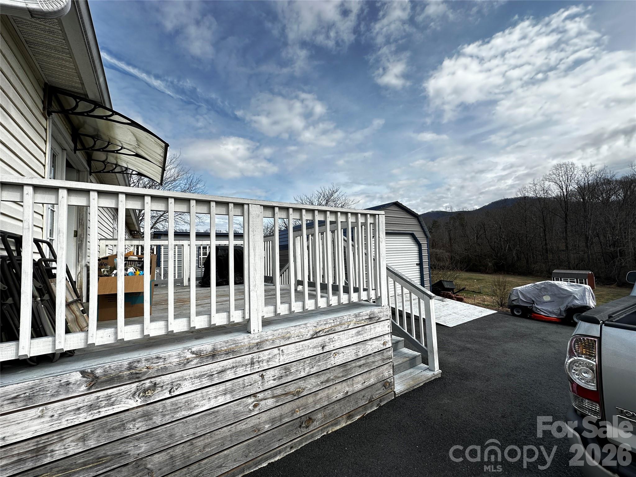 7447 Highway 64, Unit 2 Morganton, NC 28655 - Photo 3 of 27 a roof deck view with a garden