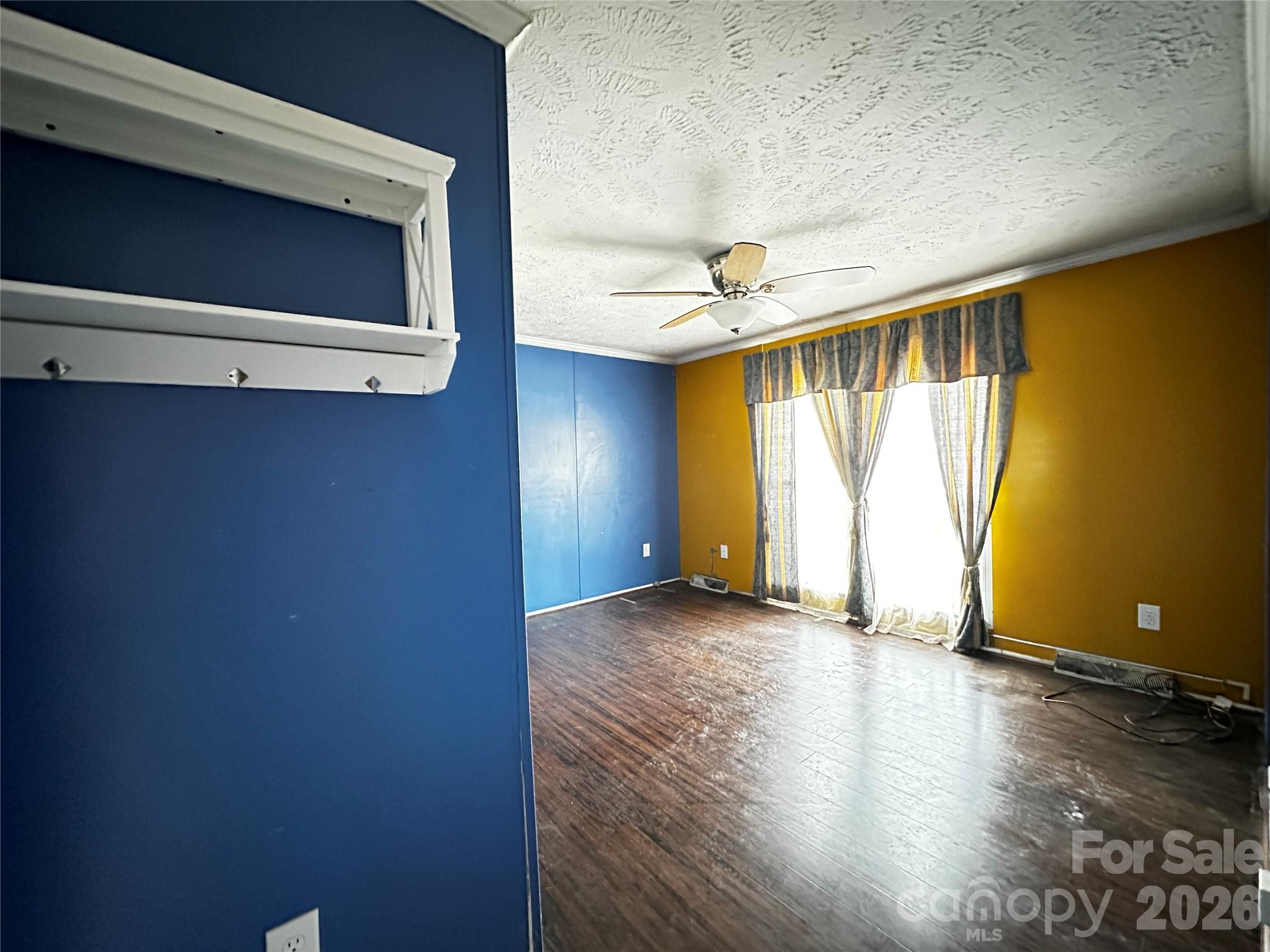 7447 Highway 64, Unit 2 Morganton, NC 28655 - Photo 10 of 27 a view of an empty room with a window
