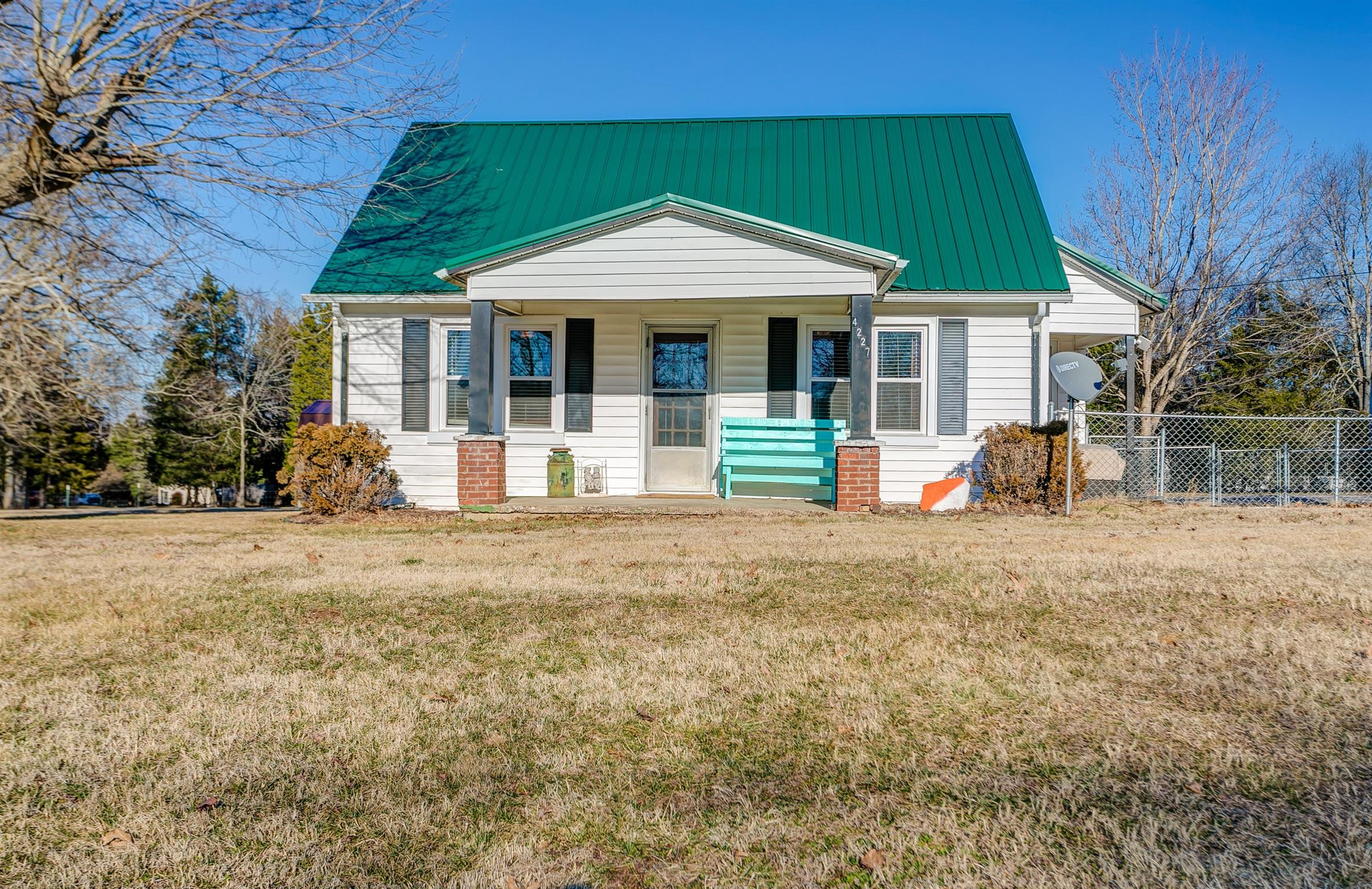 4227 Kedron Road Spring Hill, TN 37174 - Photo 1 of 13 a front view of house with yard