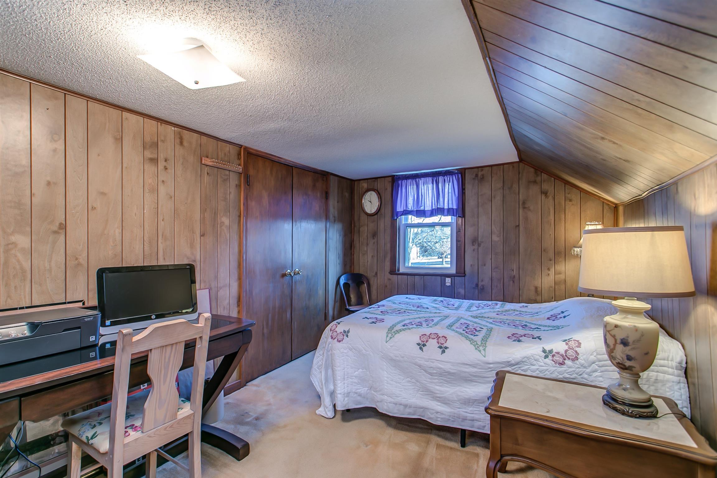 4227 Kedron Road Spring Hill, TN 37174 - Photo 11 of 13 a bedroom with a bed and a television