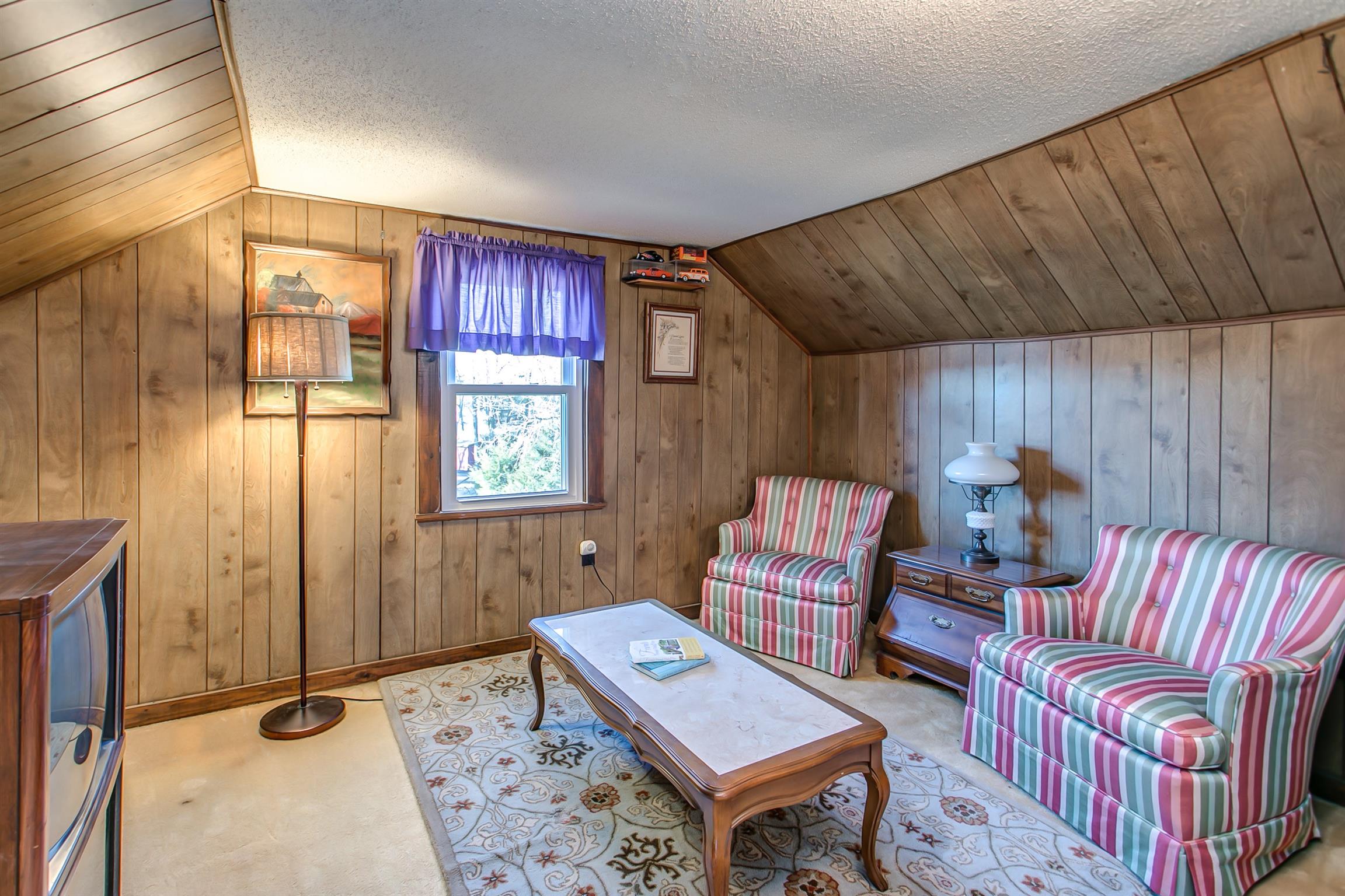 4227 Kedron Road Spring Hill, TN 37174 - Photo 12 of 13 a living room with furniture and a window