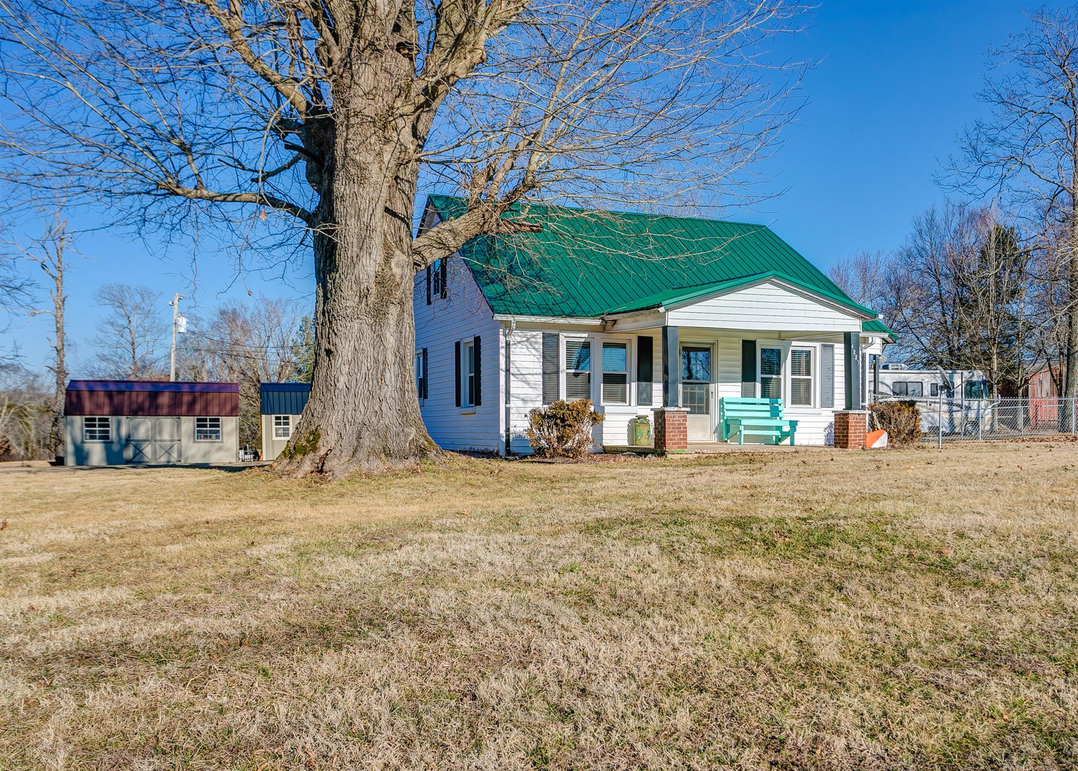 4227 Kedron Road Spring Hill, TN 37174 - Photo 3 of 13 a front view of a house with a yard