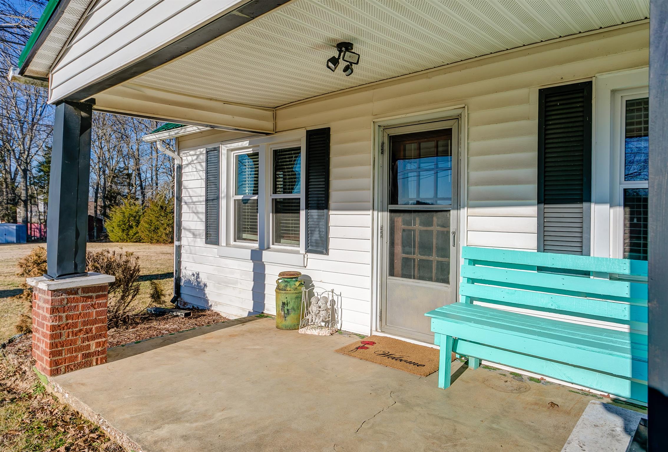 4227 Kedron Road Spring Hill, TN 37174 - Photo 4 of 13 a front view of a house with a outdoor seating
