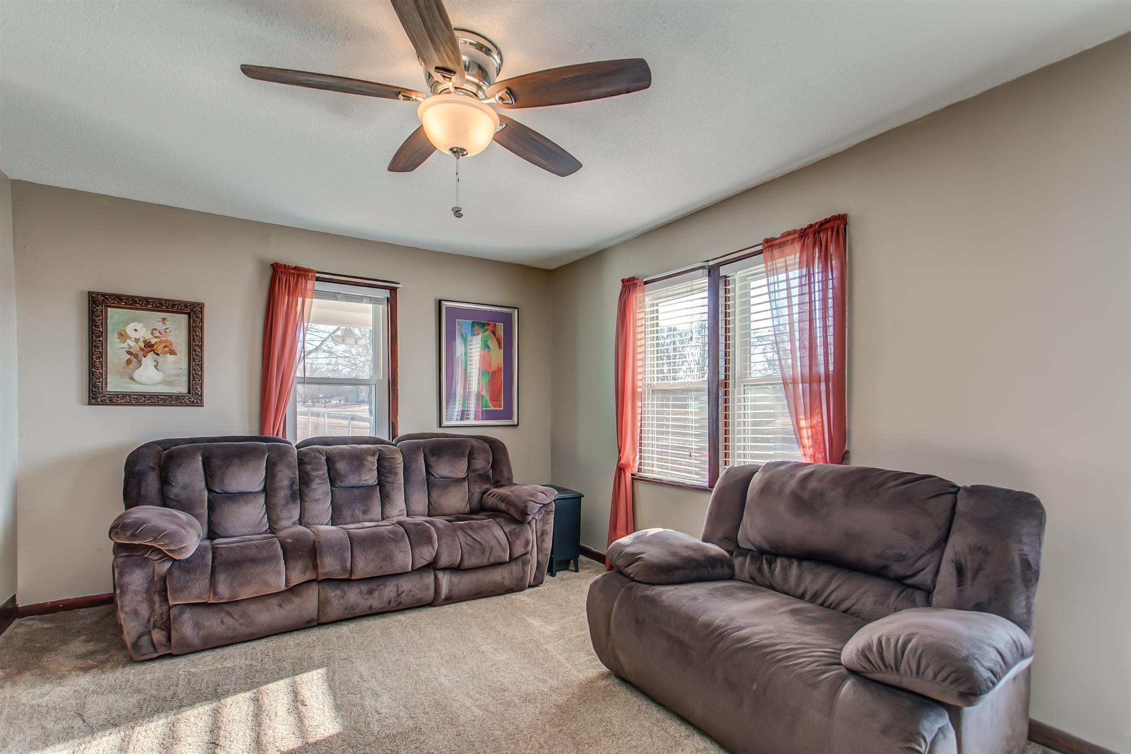 4227 Kedron Road Spring Hill, TN 37174 - Photo 5 of 13 a living room with furniture ceiling fan and a window