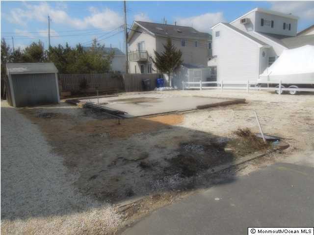109 South Bayside Road Lavallette, NJ 08735 - Photo 3 of 5 a view of a backyard
