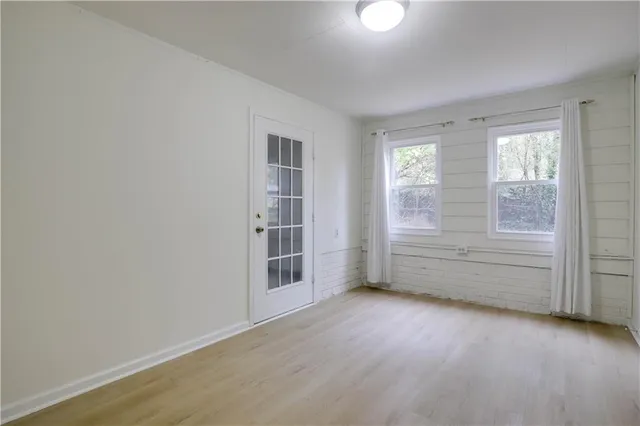 an empty room with windows