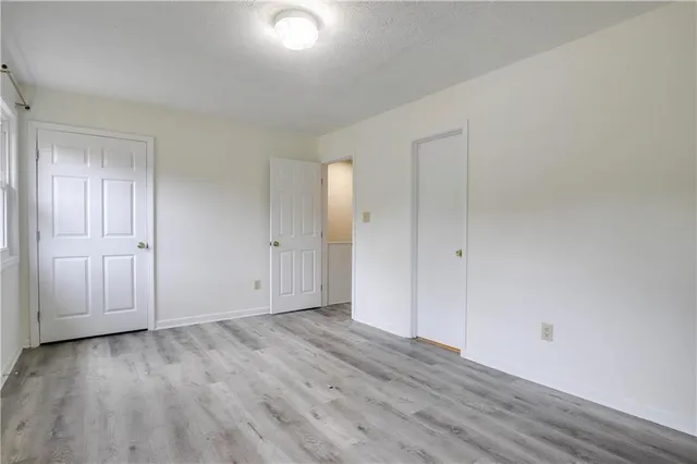 a bathroom with a sink a toilet and bathtub