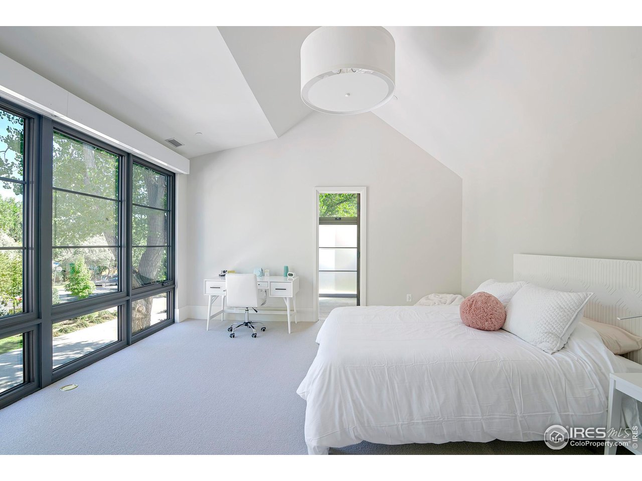 3621 21st Street Boulder, CO 80304 - Photo 32 of 50 Secondary bedroom 3 with floor to ceiling windows, ensuite bathroom, walk in closet and automated window coverings