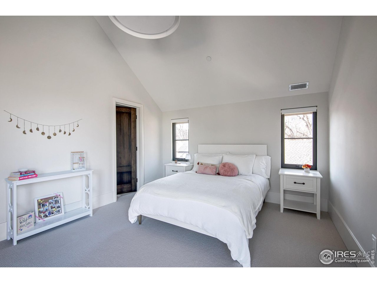 3621 21st Street Boulder, CO 80304 - Photo 34 of 50 Secondary bedroom 2 with floor to ceiling windows, ensuite bathroom, walk in closet and automated window coverings