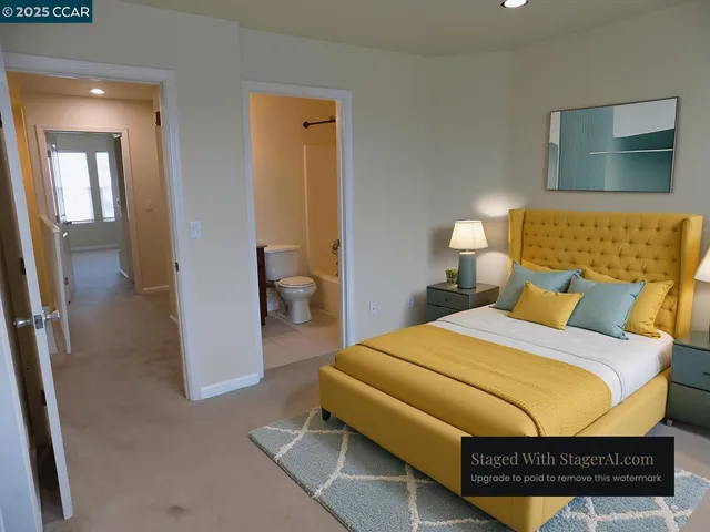 an empty room and a bathroom