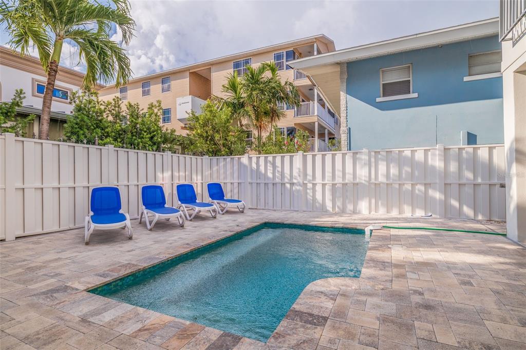 1800 Gulf Boulevard, Unit 1 Indian Rocks Beach, FL 33785 - Photo 11 of 97 a view of a backyard with sitting area and tub