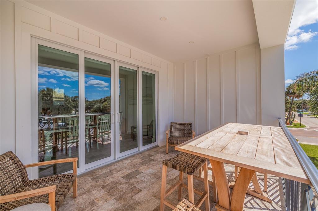 1800 Gulf Boulevard, Unit 1 Indian Rocks Beach, FL 33785 - Photo 32 of 97 a bedroom with a bed and a window