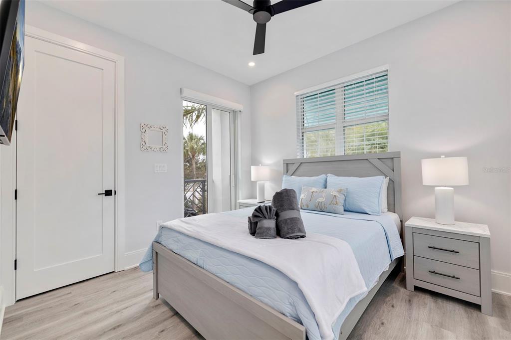 1800 Gulf Boulevard, Unit 1 Indian Rocks Beach, FL 33785 - Photo 38 of 97 a bedroom with a bed and a window