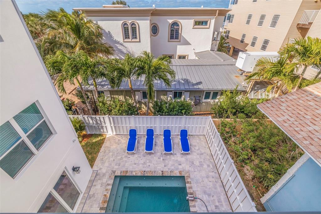 1800 Gulf Boulevard, Unit 1 Indian Rocks Beach, FL 33785 - Photo 5 of 97 a view of balcony with seating space and potted plants