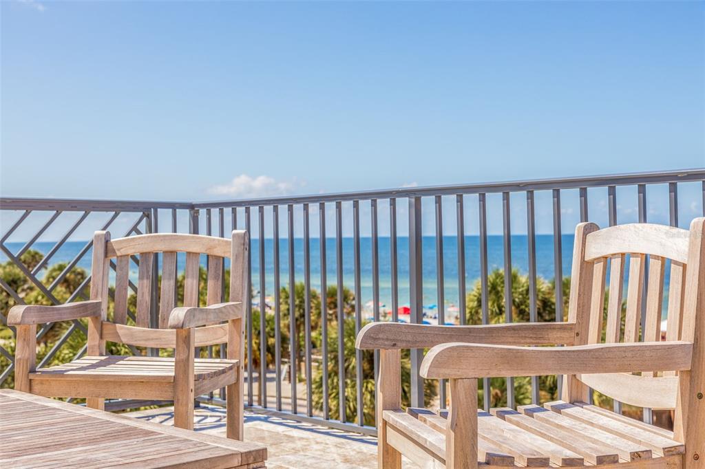 1800 Gulf Boulevard, Unit 1 Indian Rocks Beach, FL 33785 - Photo 72 of 97 a view of a balcony with outdoor seating