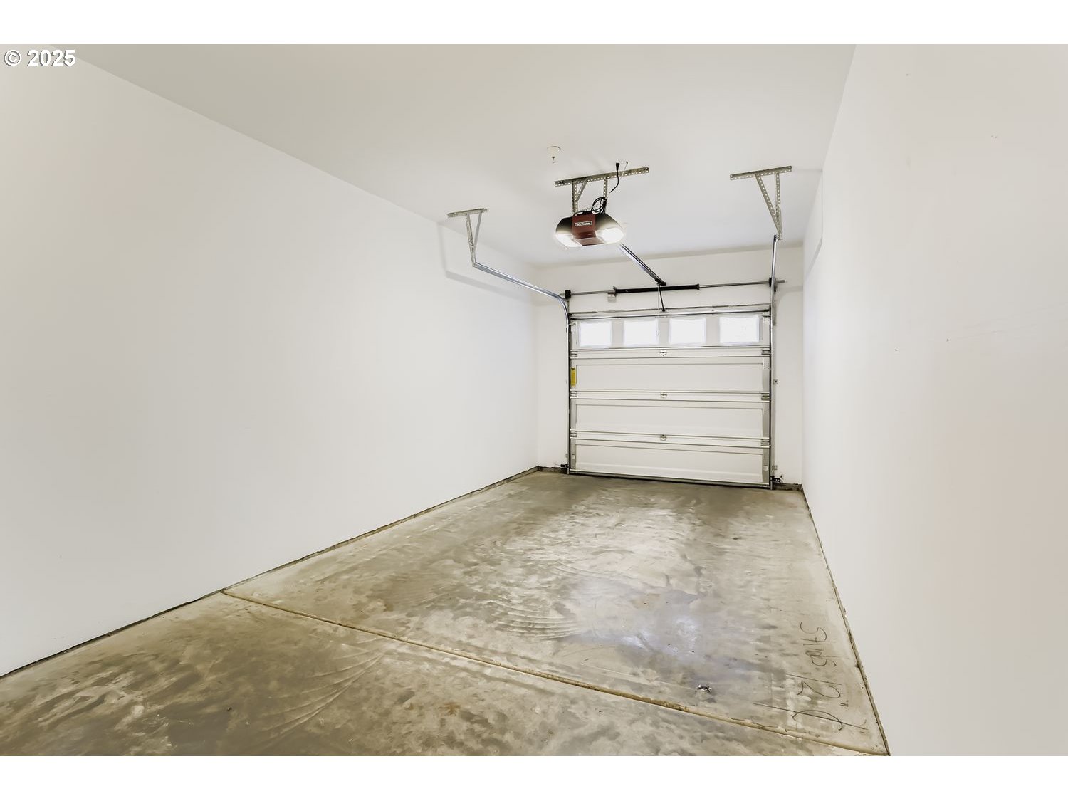 16449 Northwest Chadwick Way, Unit 305 Portland, OR 97229 - Photo 11 of 11 a view of a garage